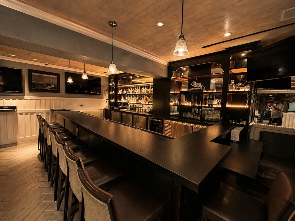 Premium bar with craft cocktails and TVs